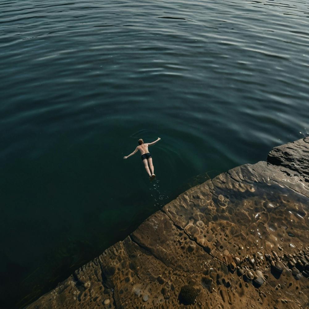 Person Swimming In The Sea