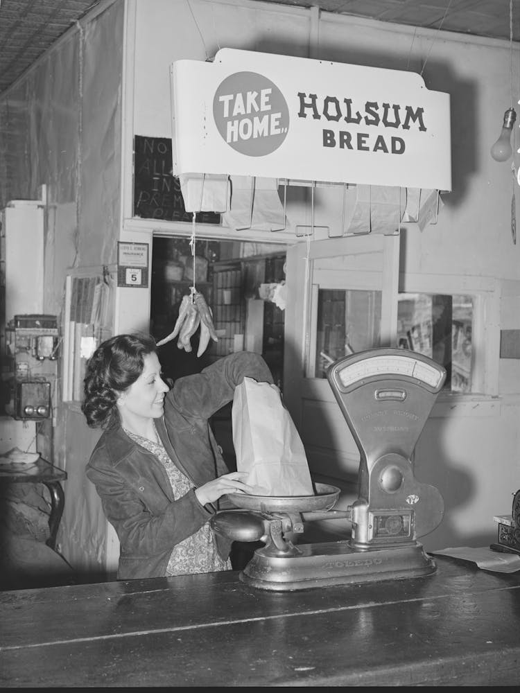 Grocery Clerk Weighing Up Potatoes, Concho, Arizona By Russell Lee