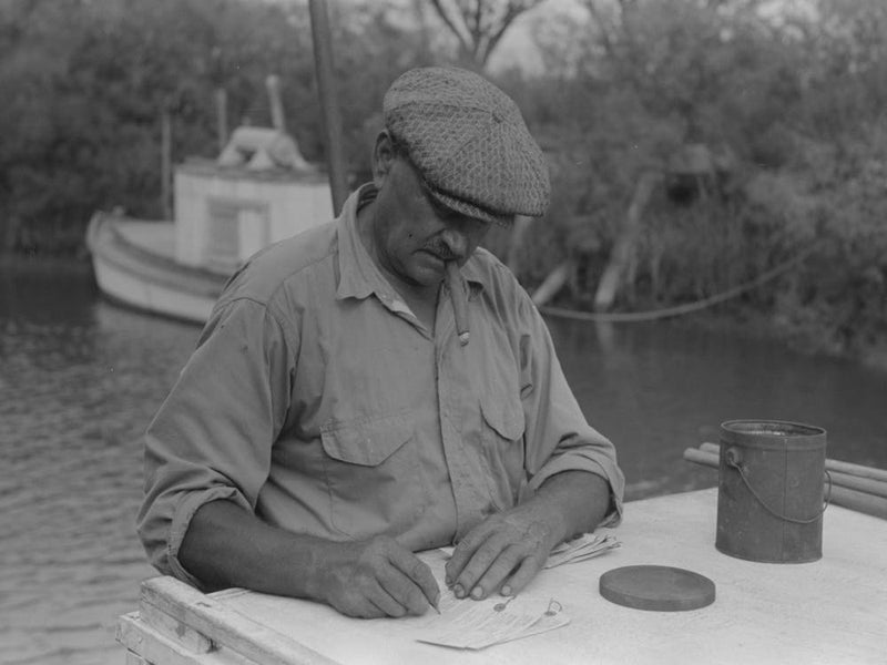 Untitled Photo, Possibly Related To Oyster Shipper Making Out Tags To Be Attached To Bags Of Oysters