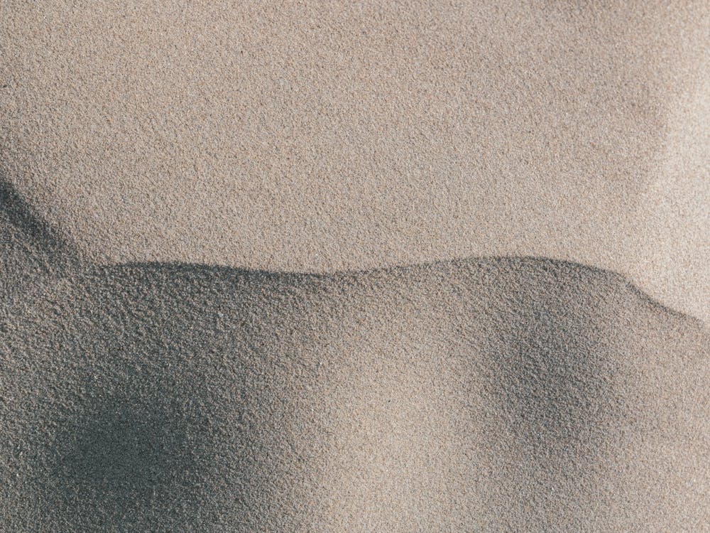 Abstract sand pattern in neutral tones - beige beach nature and travelphotography by Christa Stroo Photography