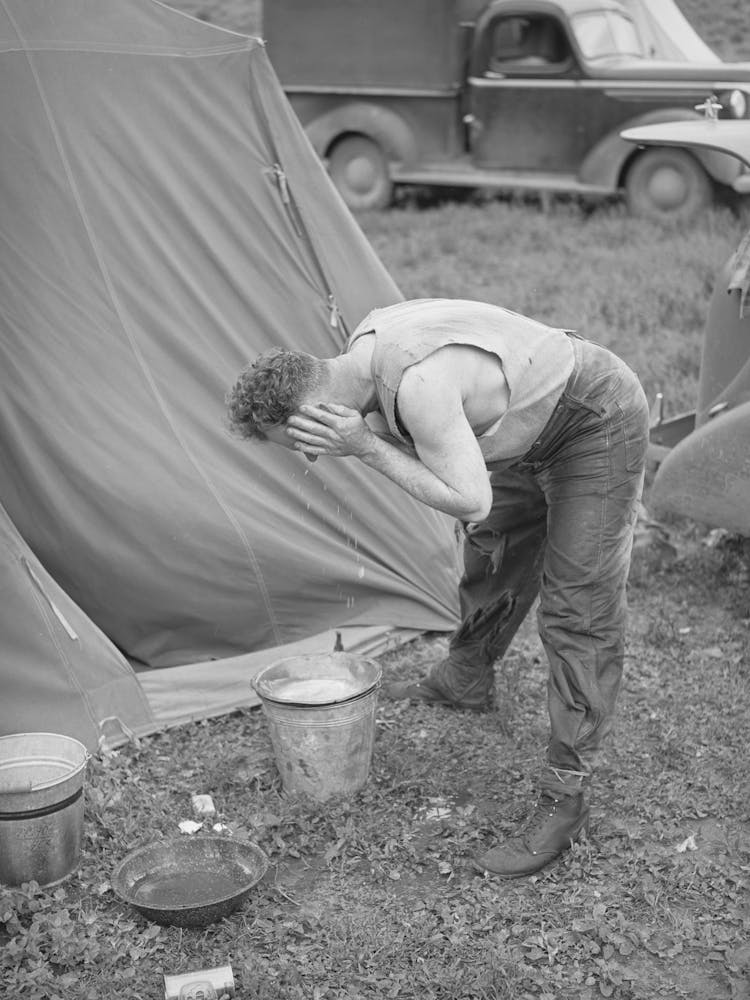 Sheep Shearer Washes Up For Dinner, Ranch In Malheur County, Oregon By Russell Lee