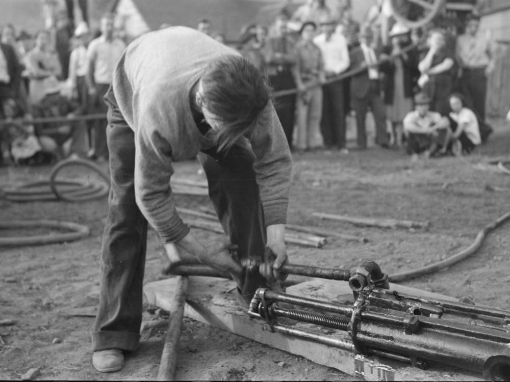 Untitled Photo, Possibly Related To Judges Inspecting Drill Which Will Be Used In Miners Power Drilling Contest