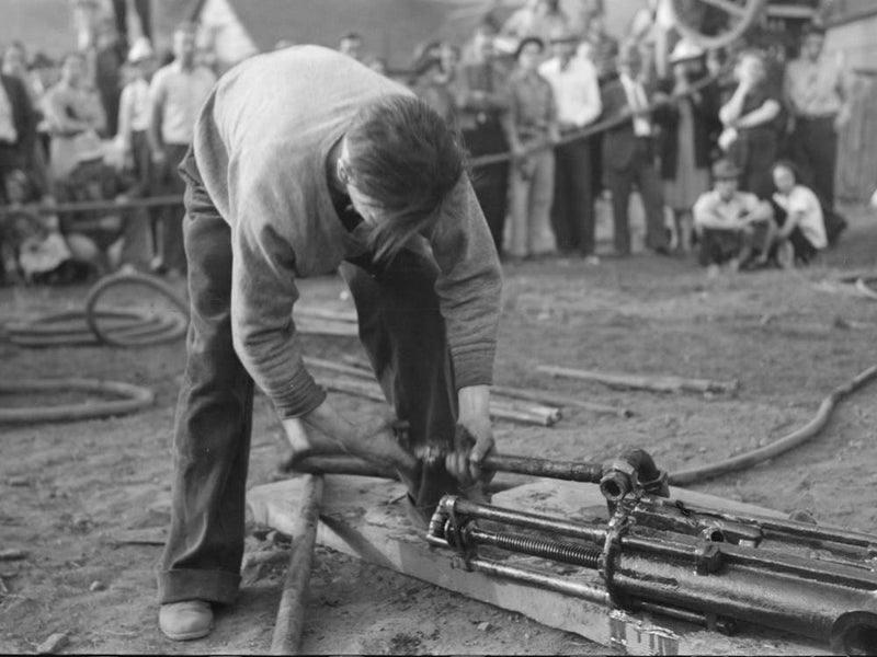 Untitled Photo, Possibly Related To Judges Inspecting Drill Which Will Be Used In Miners Power Drilling Contest
