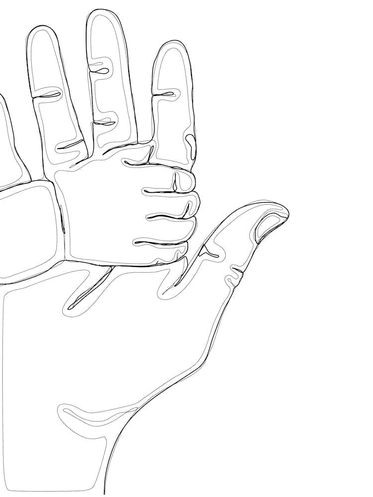 Parent's Hand Holding A Baby