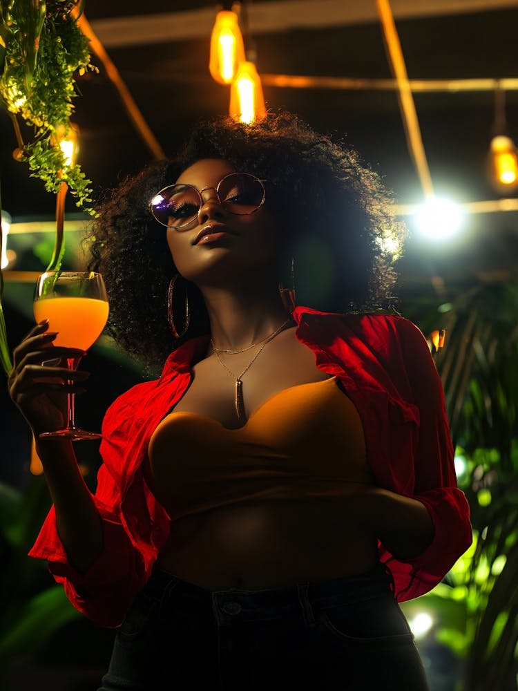 Nigerian Woman Holding A Drink