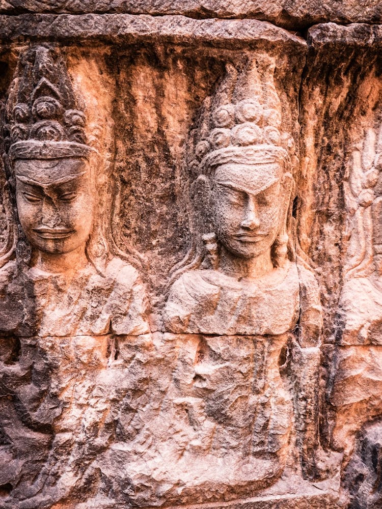Two Carved Figures Angkor Cambodia