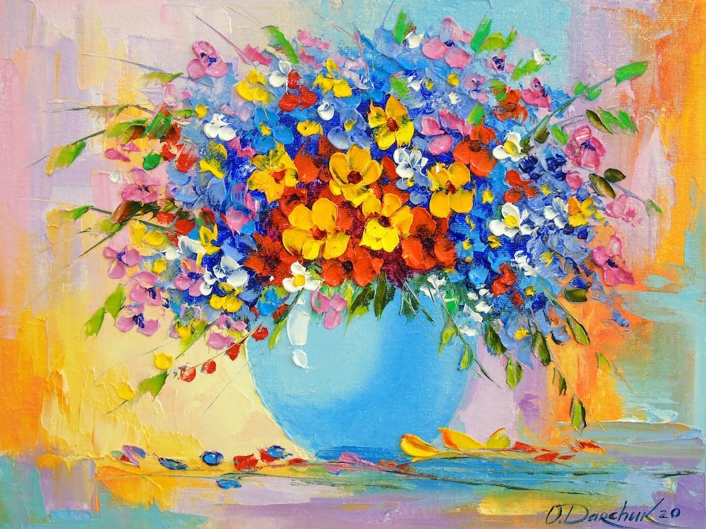 Bouquet of bright summer flowers in a vase
