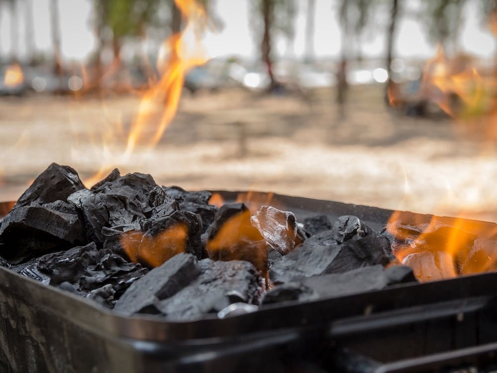 Coals Are Burned In A Bbq Grill