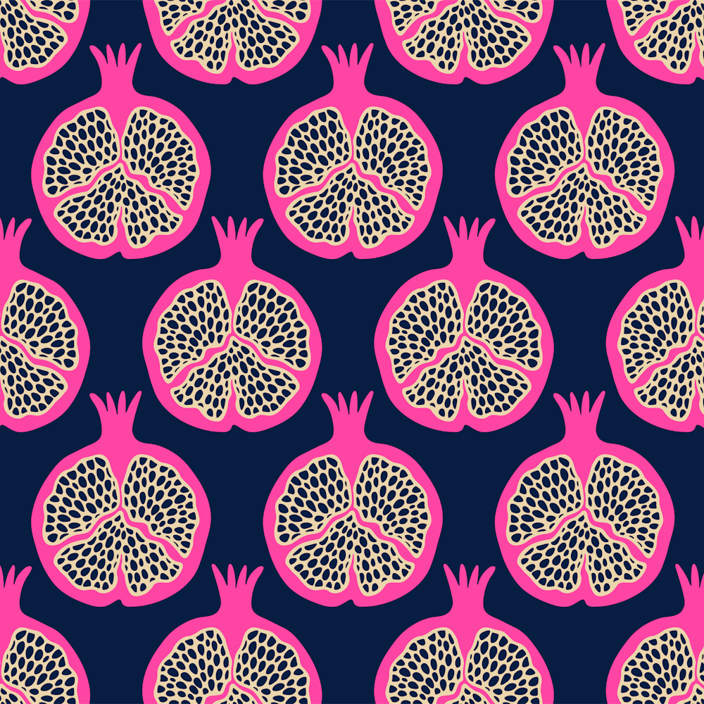 POMEGRANATES Fresh Ripe Plump Fruit in Fuchsia Hot Pink Sand on Midnight Blue