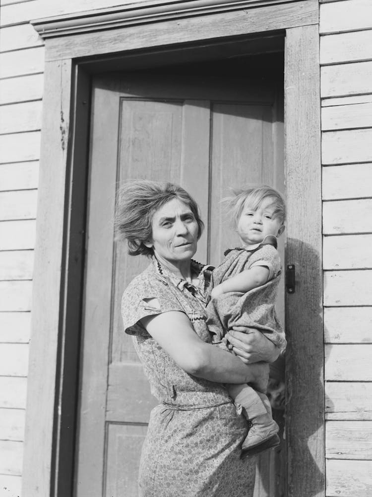 Mrs, John Baker And Baby On Steps Of Farm Home,Divide County, North Dakota By Russell Lee