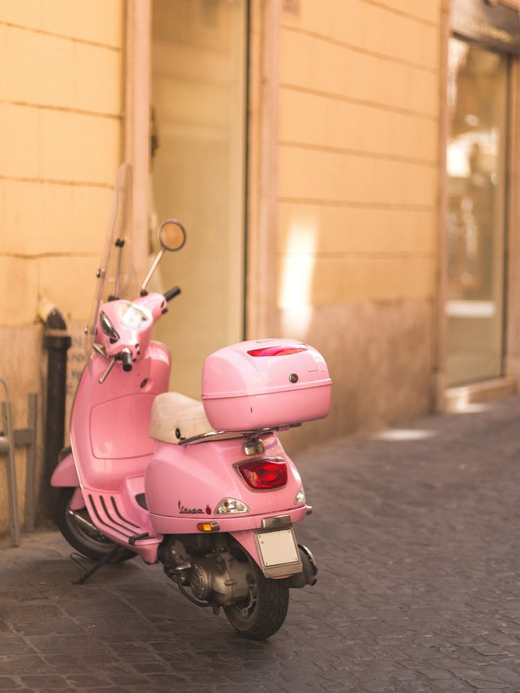 Pink Vespa In Rome Italy