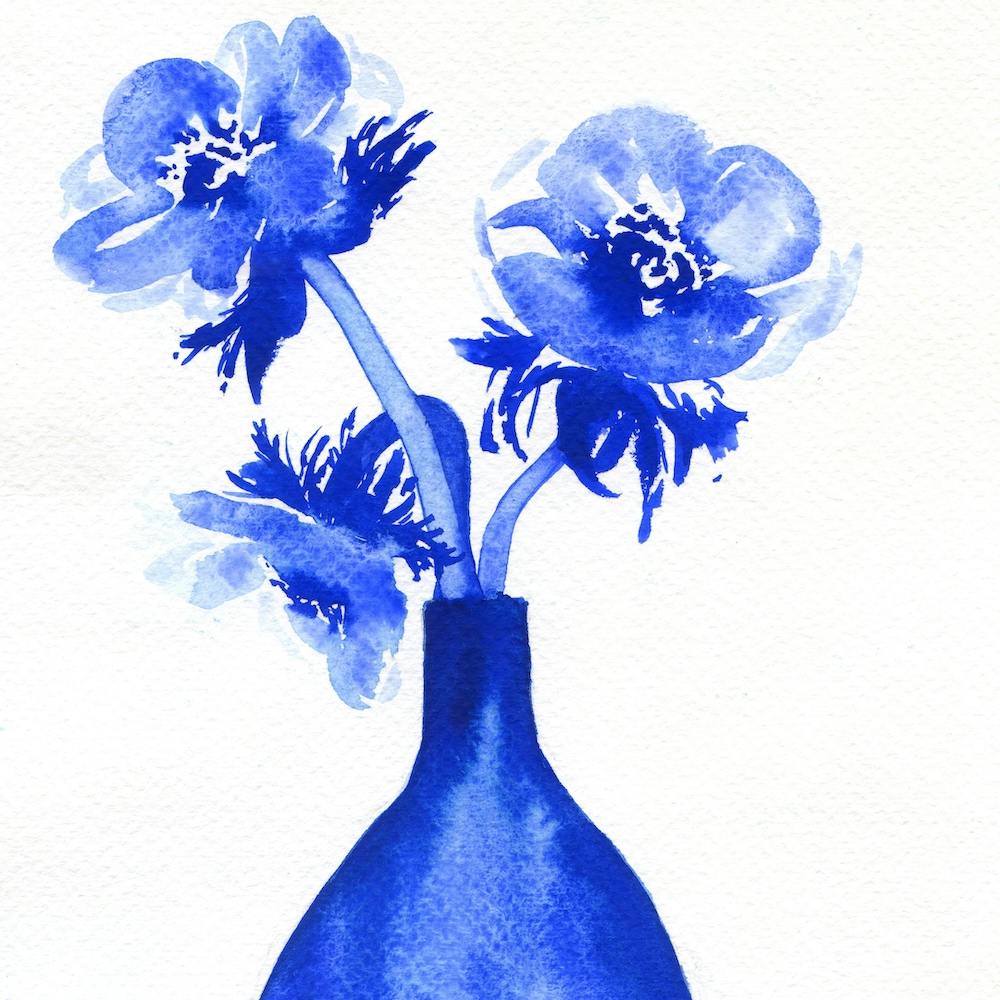 3 Blue Flowers In A Vase