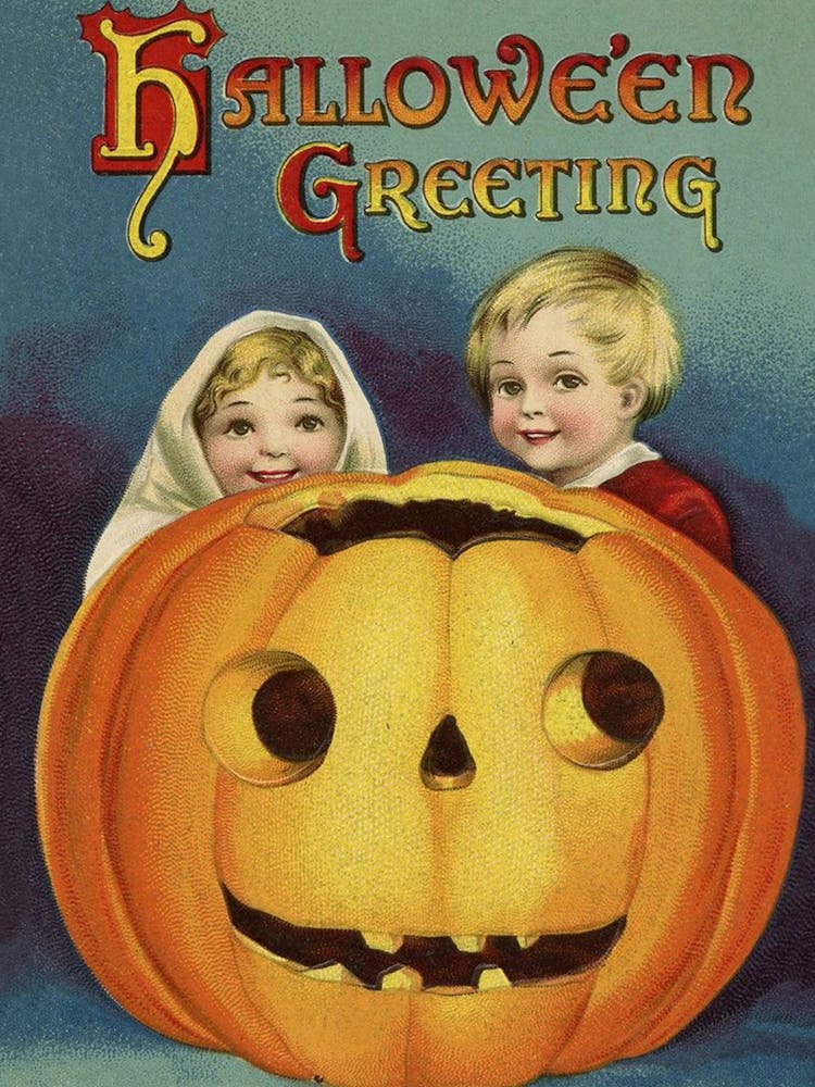 Boy And Girl Hiding Behind A Big Carved Pumpkin, With The Best Halloween Wishes