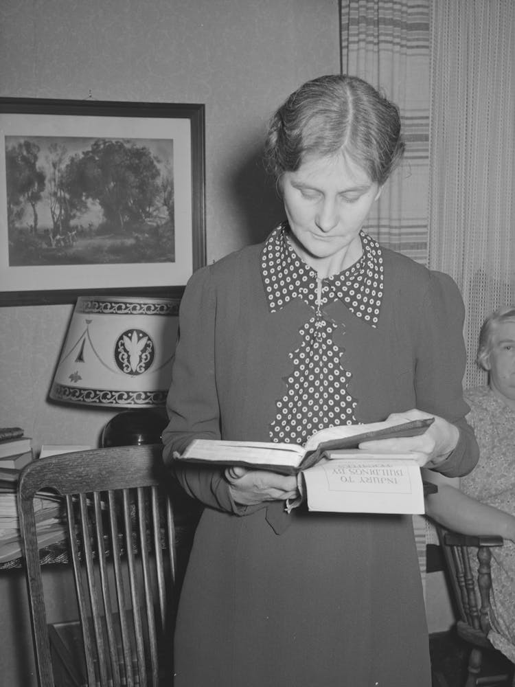 A Reading From The Scripture Is Part Of The Program Of Home Demonstration Meeting, Mcintosh County, Oklahoma