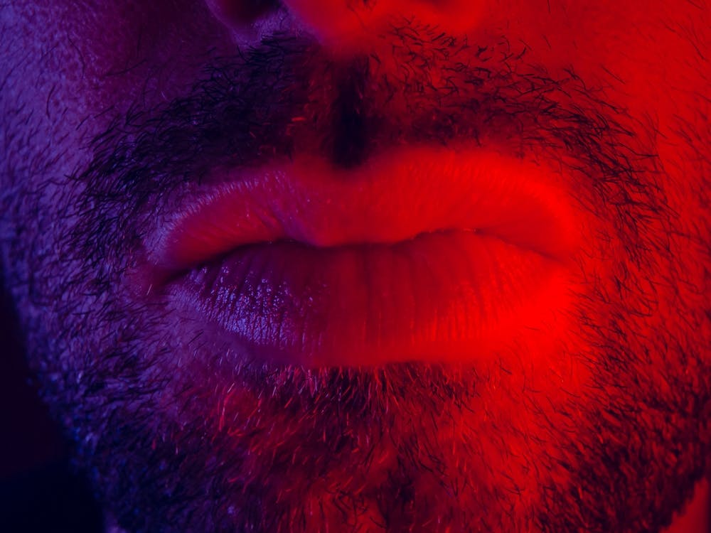 Macro Close Up On Man Mouth With Serious Facial Expression 1