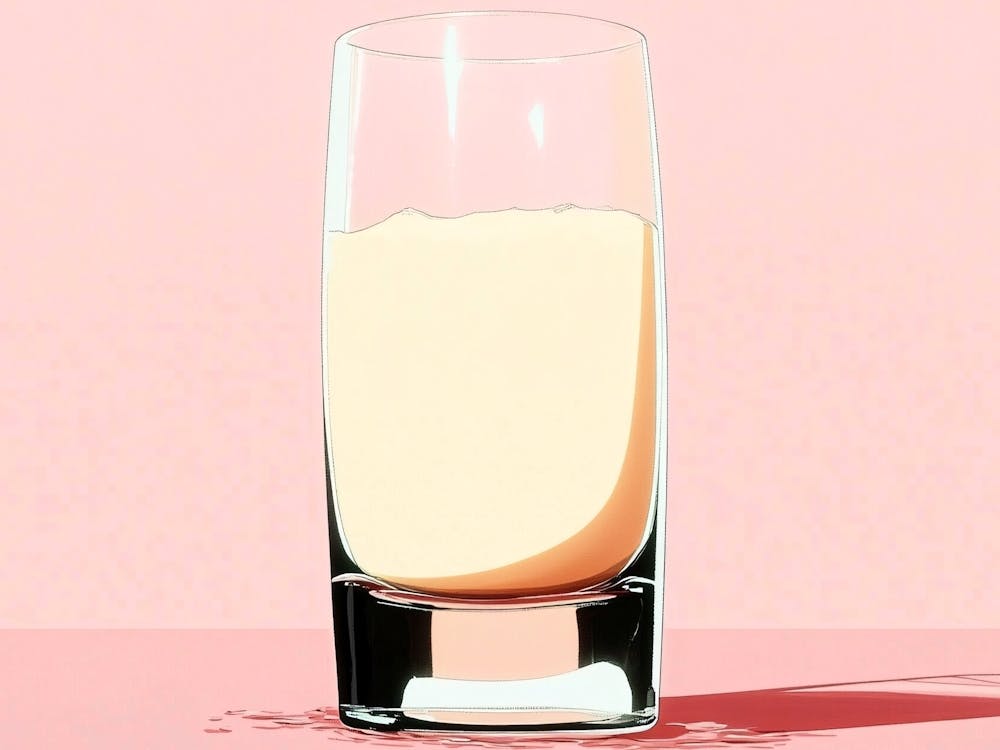 Glass Of Milk on Pink