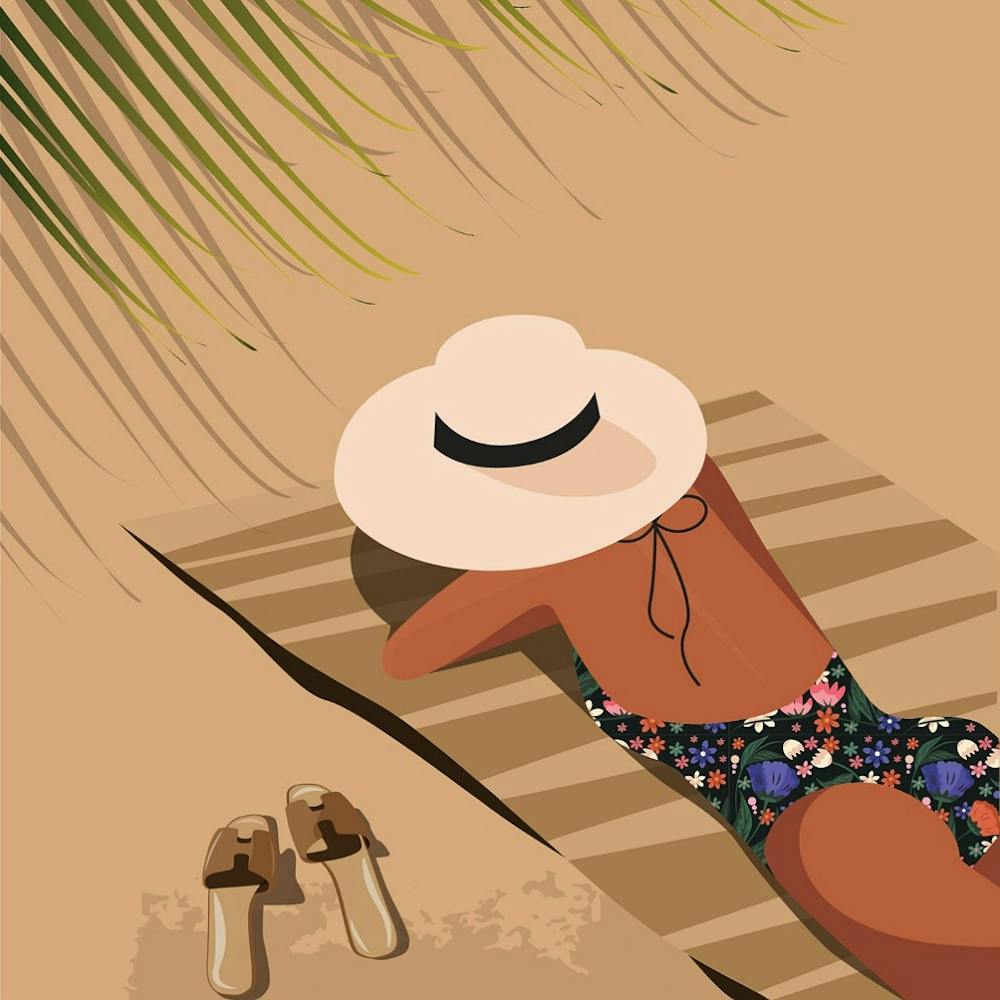 Woman Laying On The Beach