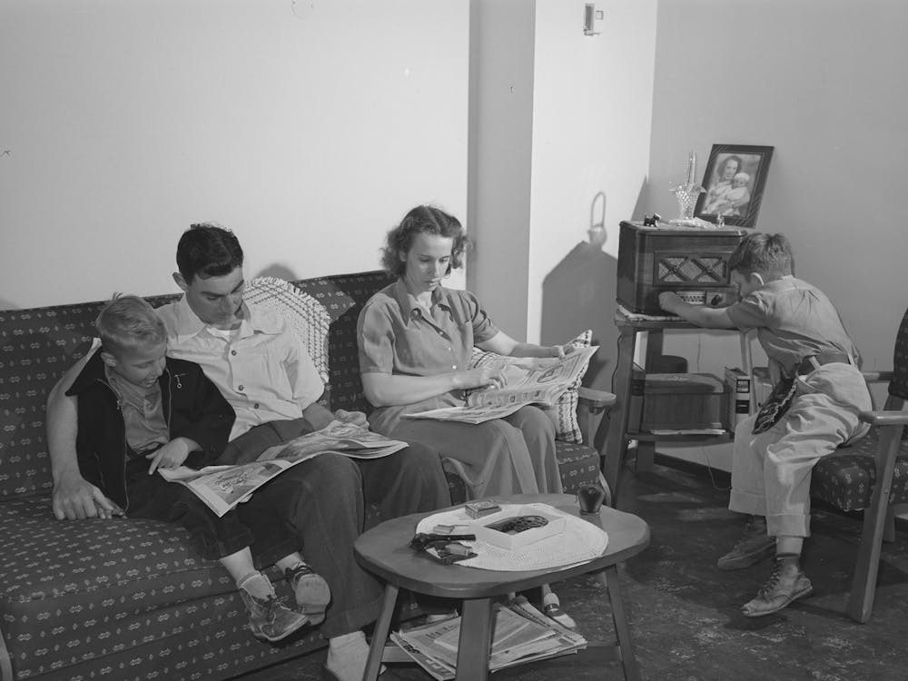 Family Of Marine In Their Living Room,They Live In One Of The Units Of The Navy Defense Housing Project Which Is