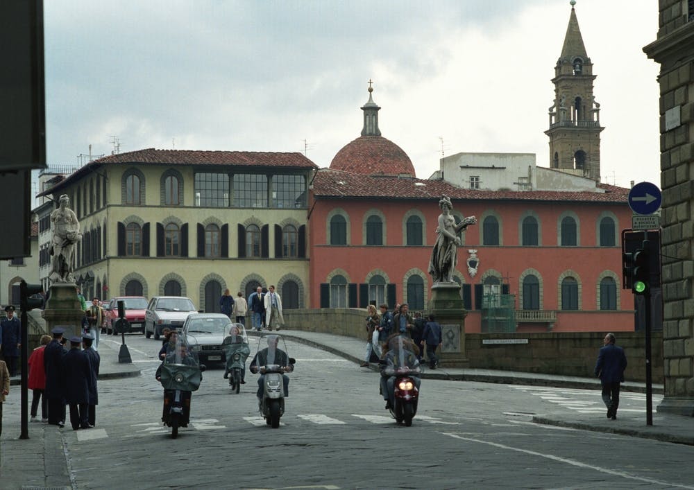 Paninari Riding Across Ponte Santa Trinita Florence