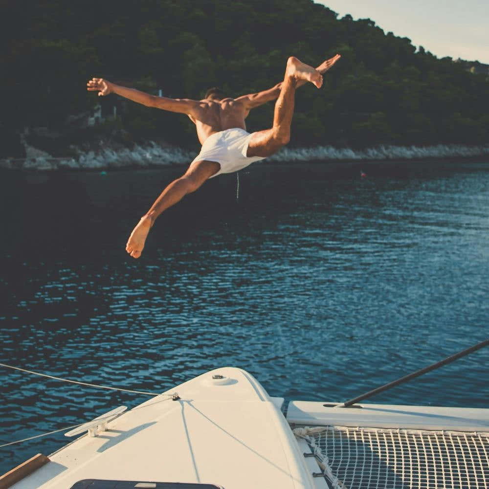 Man Jumping Off A Yacht 2