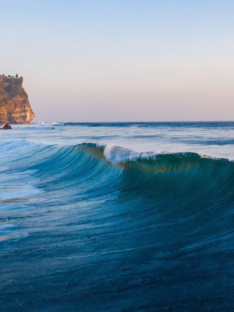 Wave Cresting In Bali Indonesia