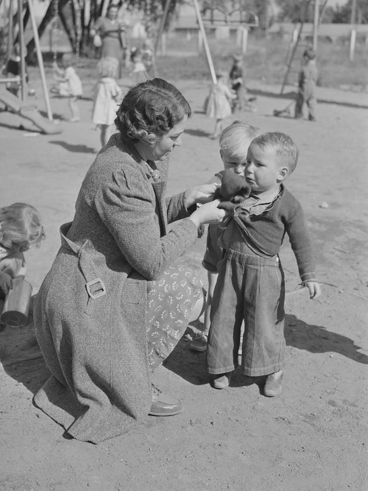 Children And Their Teacher At The Fsa (Farm Security Administration) Farm Family Migratory Labor Camp