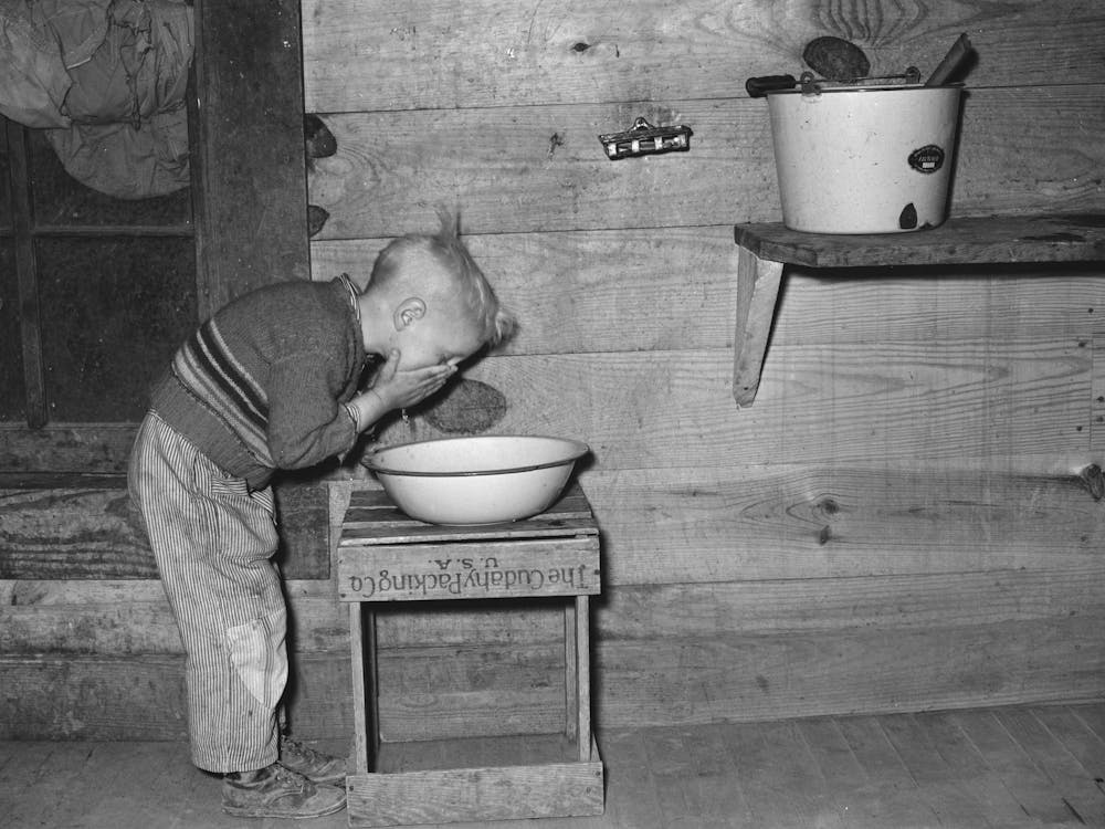 Son Of Sharecropper Washing Face, Near Pace, Mississippi, Background, Sunflower Plantation, Mississippi By
