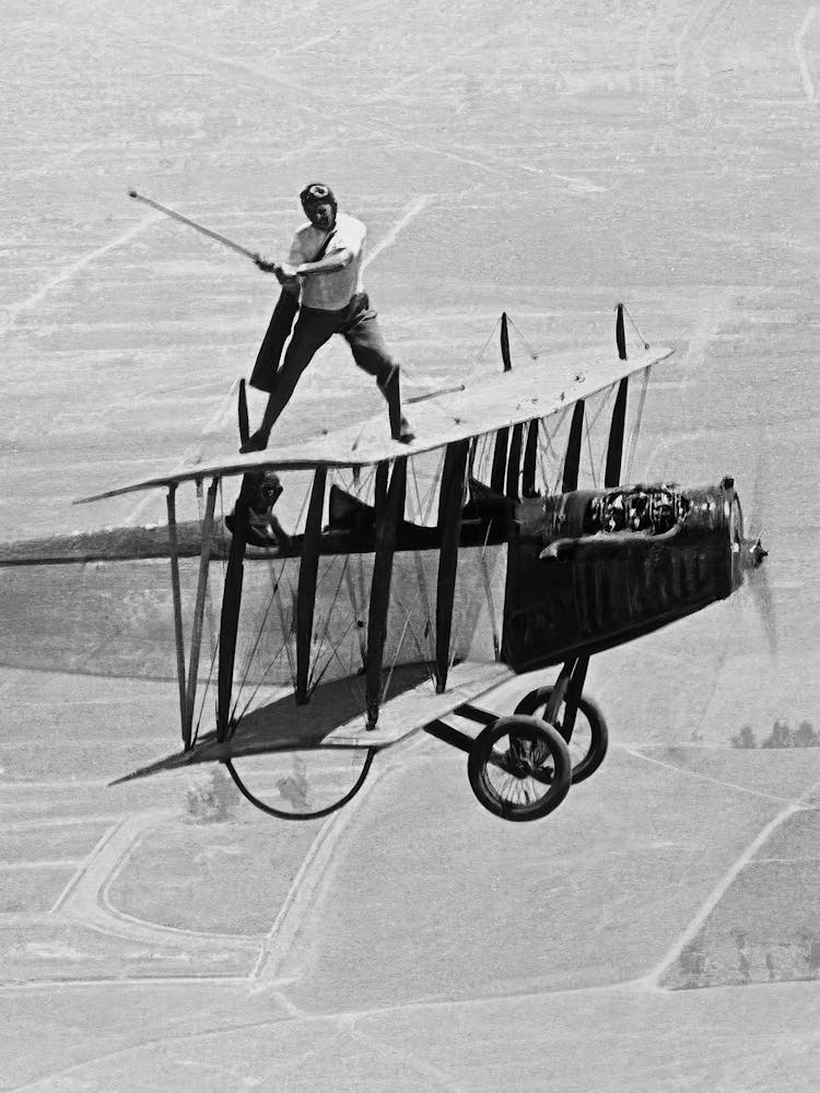 Man Golfing On Biplane, Vintage Black and White Old Photo