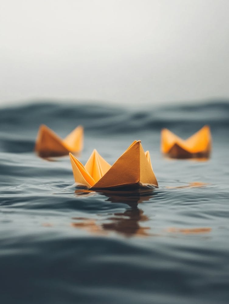 Paper Boat In The Ocean