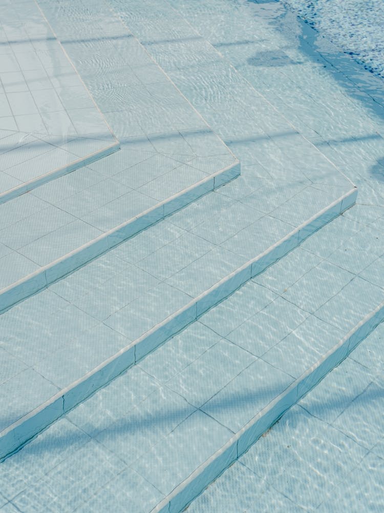 Blue Stairs In A Swimming Pool