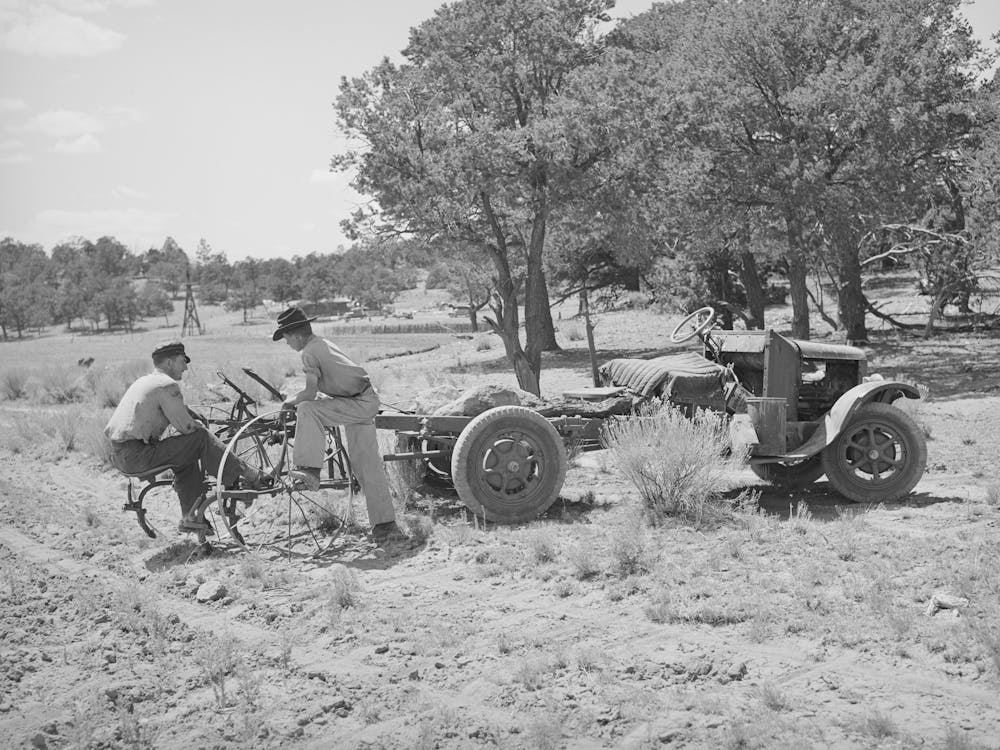 Farmer And His Younger Brother With Tractor Which Has Been Adapted From Truck, Pie Town, New Mexico By Russ