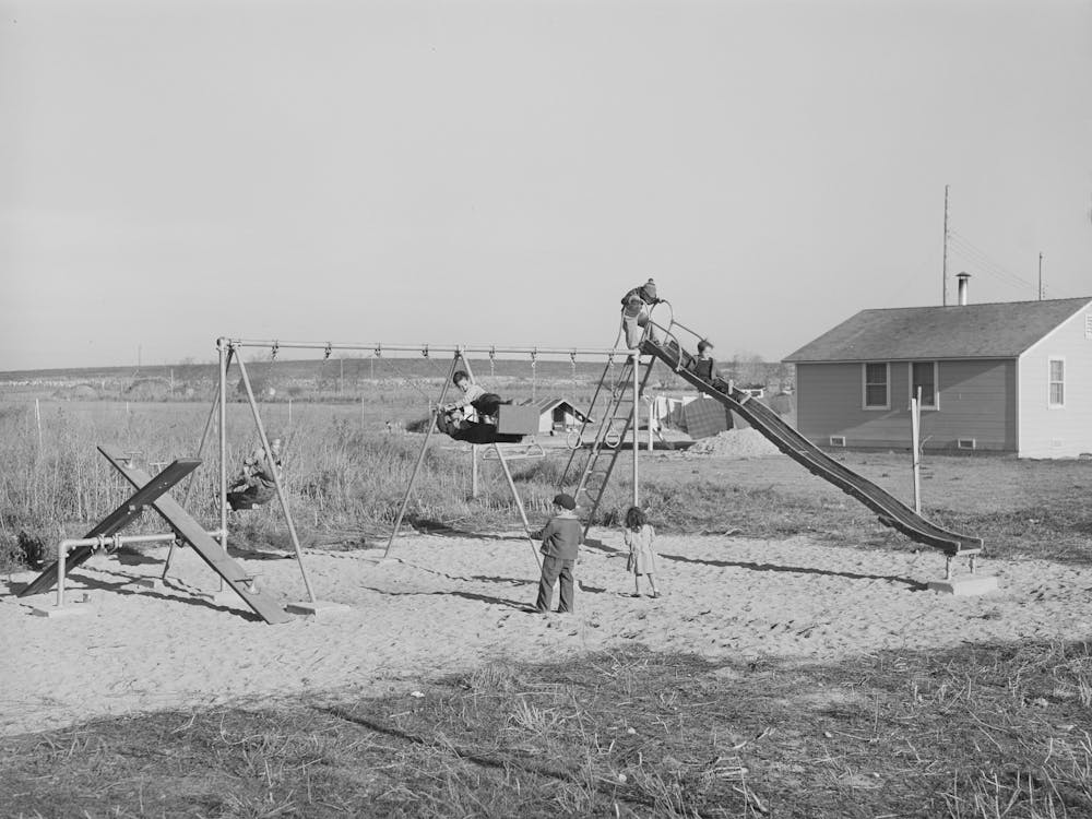 Children At Play At The Fsa (Farm Security Administration) Camp For Farm Families,Caldwell, Idaho By Russell Lee