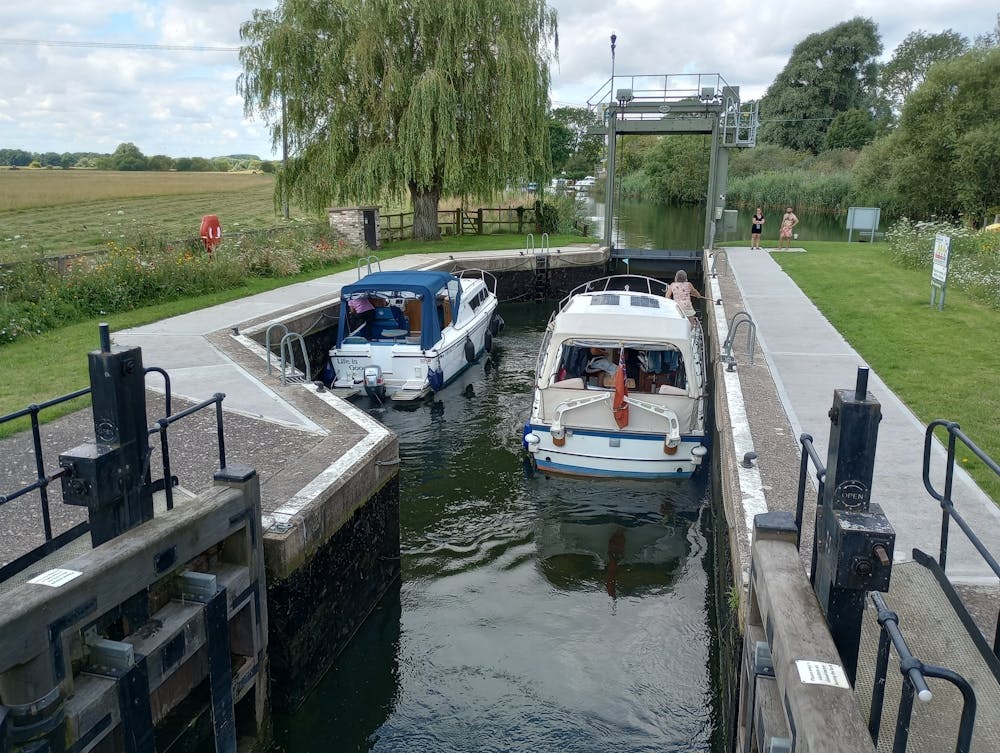 Boats in a lock photo Cambridgeshire UK