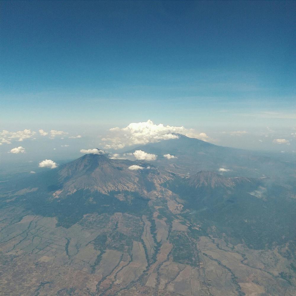 Airplane Window View Of Volanoes Square