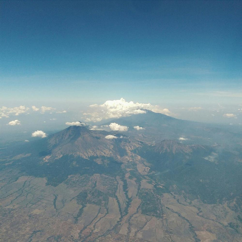 Airplane Window View Of Volanoes Square
