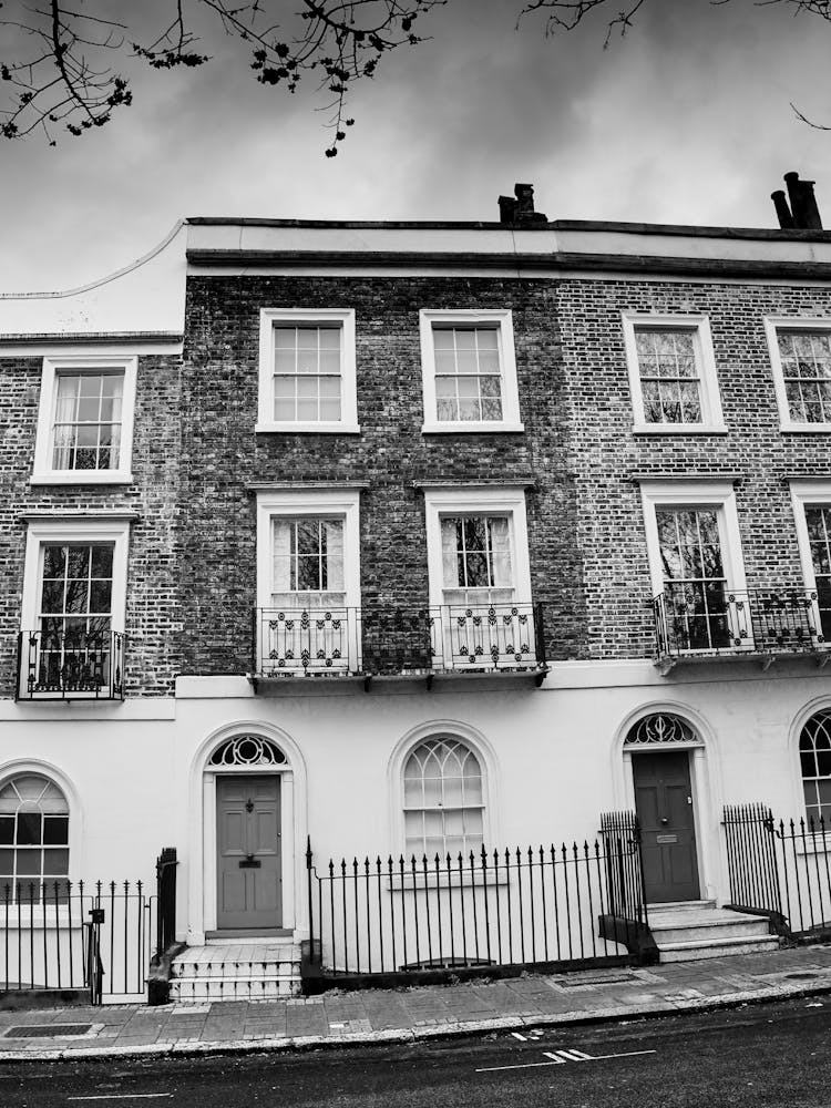 Black And White Image Of A Row Of Houses