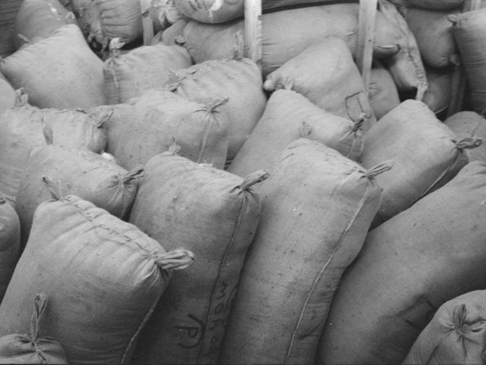Untitled Photo, Possibly Related To Sacks Of Mohair In Storage At The Warehouse Of The Kimble Wool And