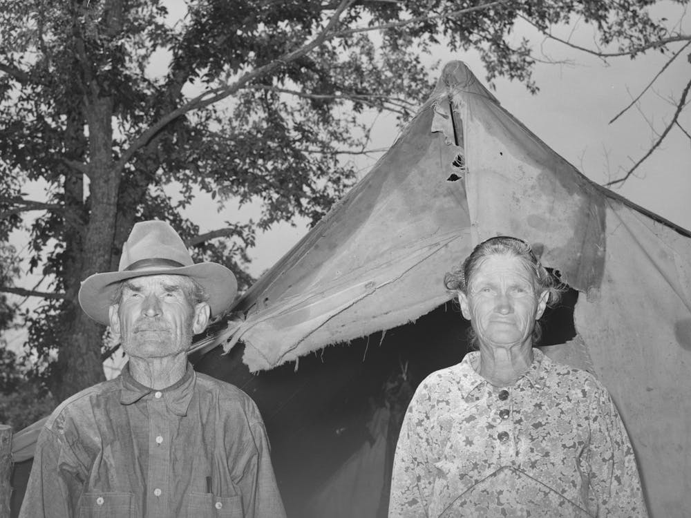 Old Couple Who Have Moved Into Tent Home Near Sallisaw, Oklahoma, In Order To Save Rent And Cost Of Wood In Town