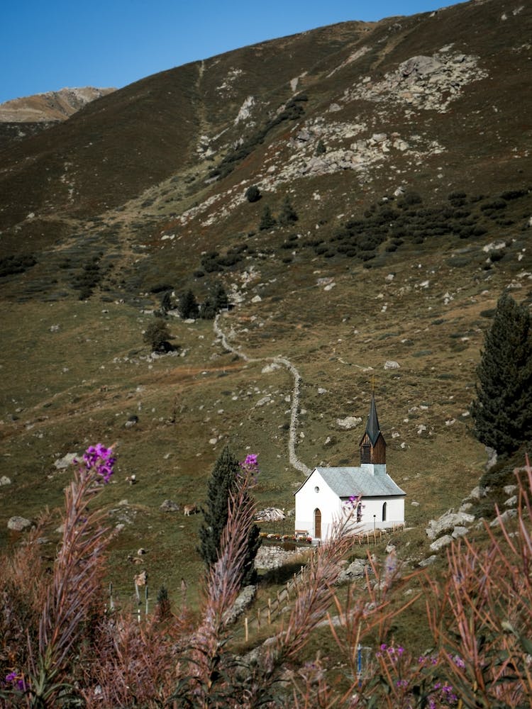 Chapel In De Mountains In Switzerland
