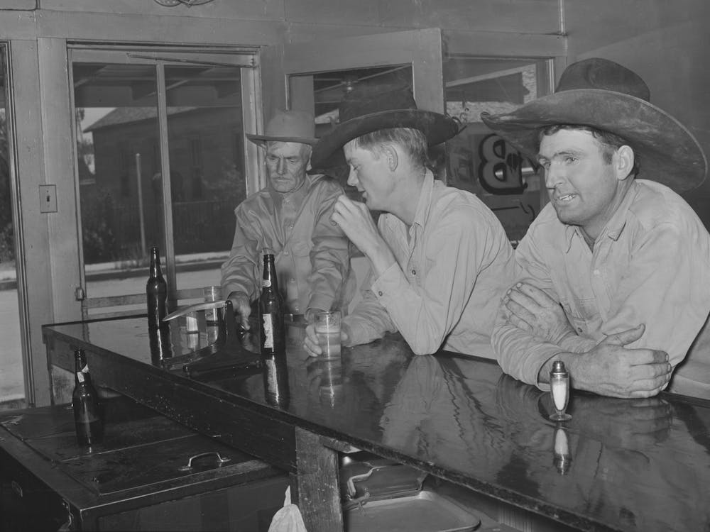 Cowboys In Beer Parlor, Alpine, Texas By Russell Lee