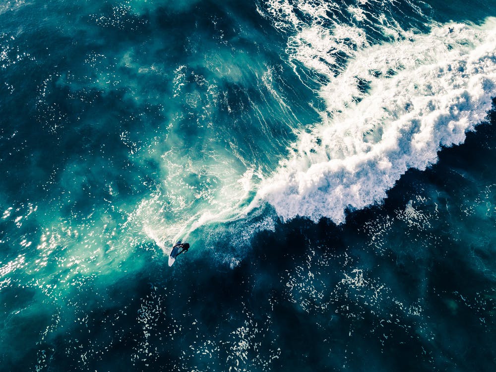 Surfer Catching Dramatic Wave