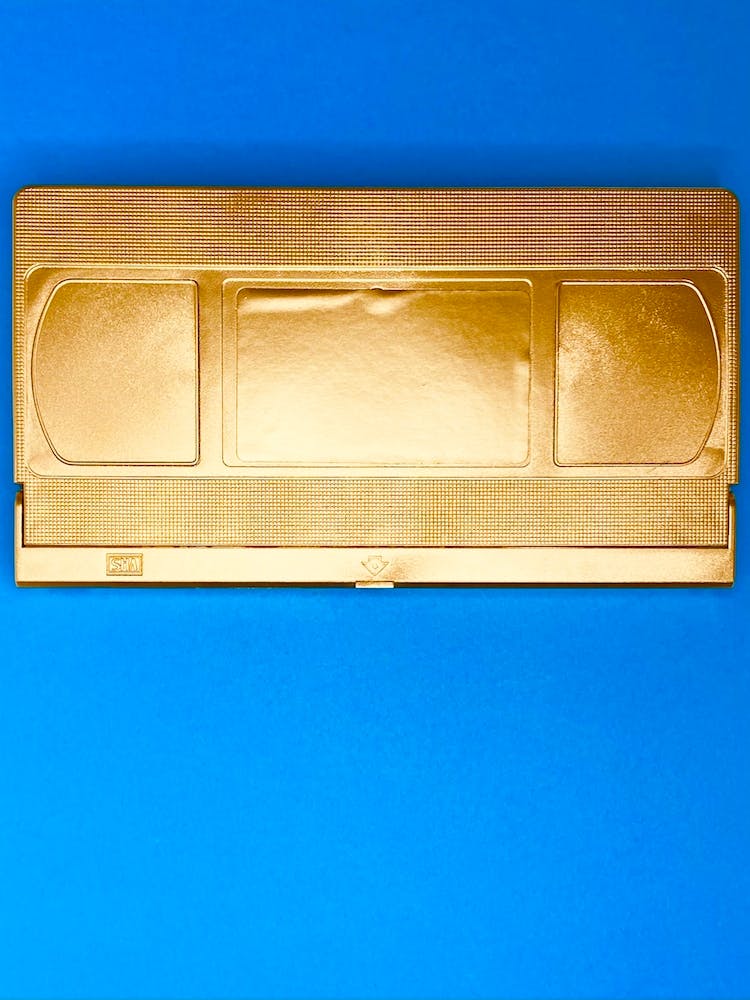 VHS Tape - Gold on Light Blue