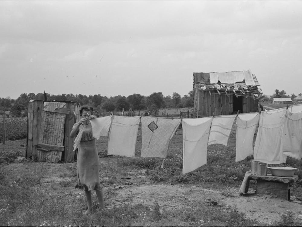 Untitled Photo, Possibly Related To Daughter Of Tenant Farmer Hanging Up Clothes Near Warner, Oklahoma By