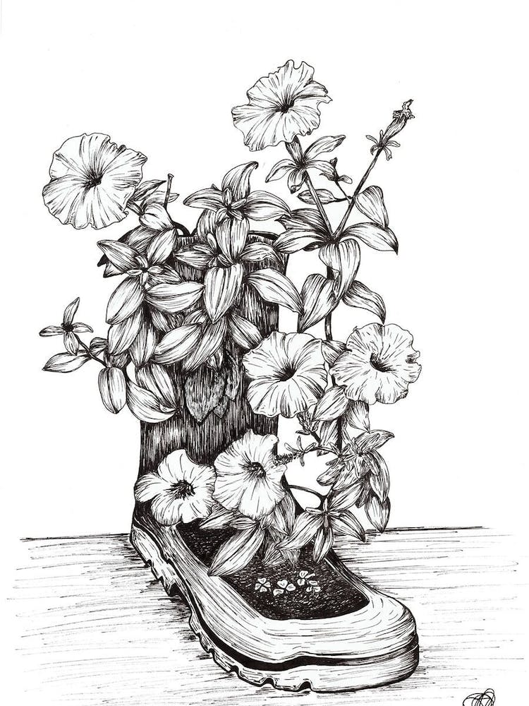 Black and White Flowers in a Boot