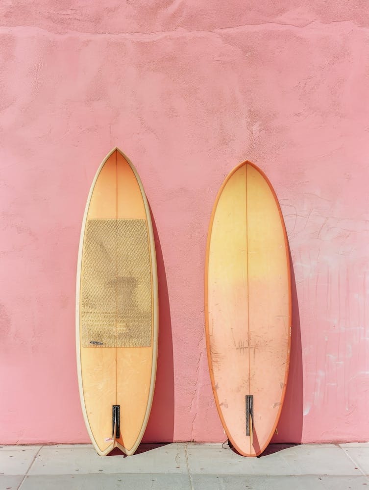 Surfboards Against A Pink Wall 1