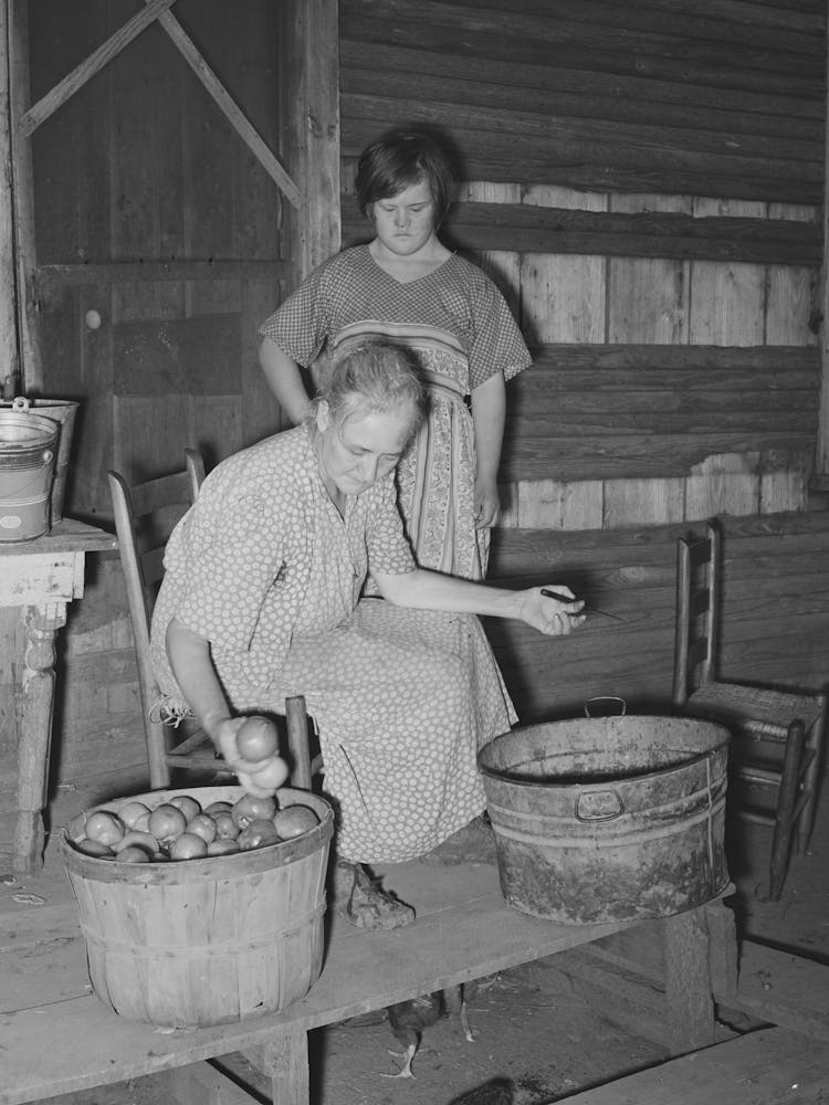 Wife Of Tenant Farmer Living Near Muskogee Picking Over Tomatoes Before Peeling For Canning, Refer To General