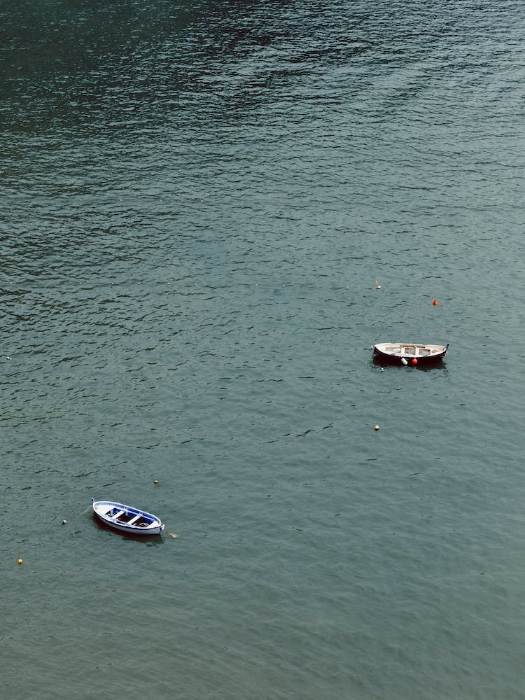 Boats Floating In The Sea Of Italy