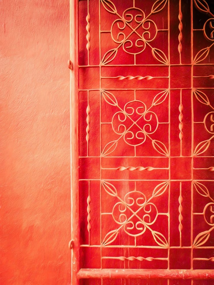 Red Painted Wall & Wrought Iron Gate