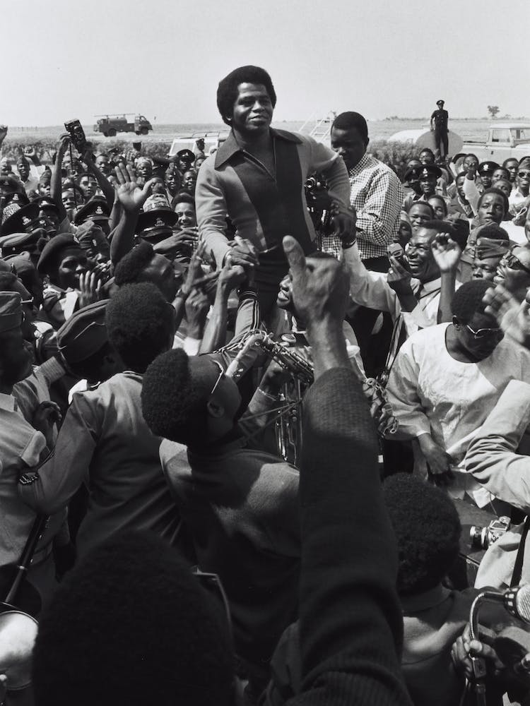 Singer James Brown Being Greeted By Fans Upon His Arrival At Kaduna Airport, 1970
