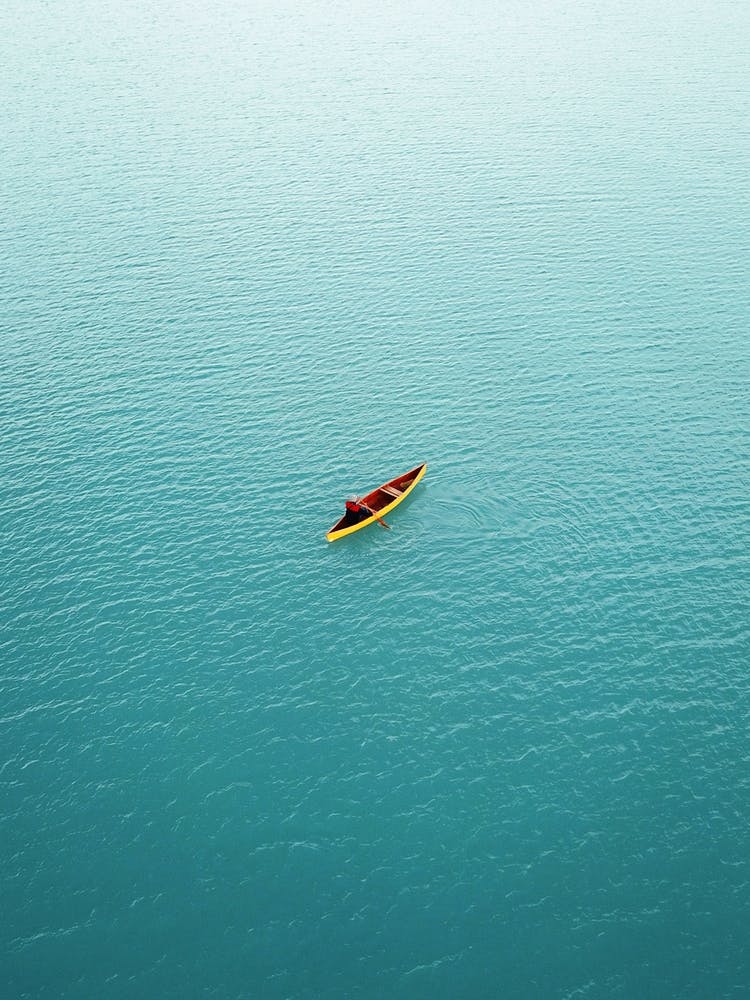 Canoe On A Glacial Lake